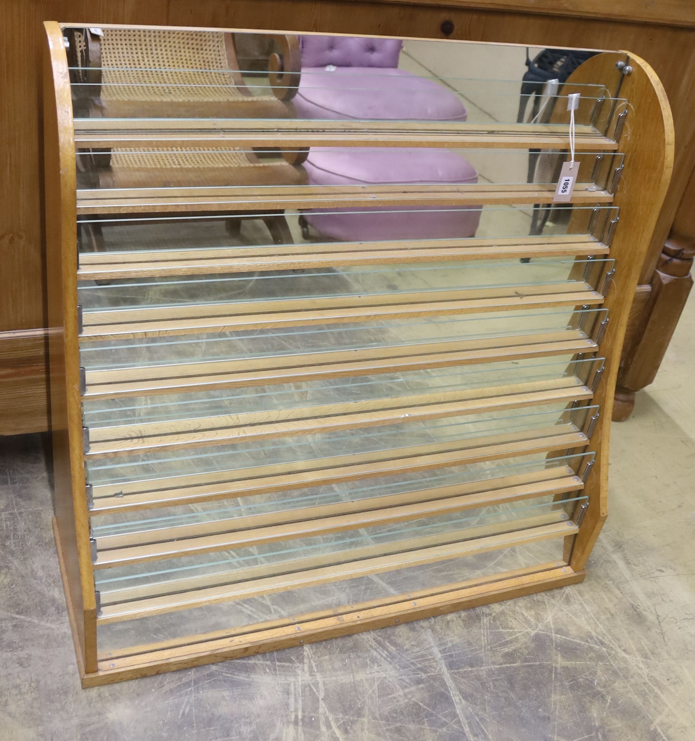 A mid century mirrored oak countertop shop shelving unit, length 94cm, depth 36cm, height 92cm